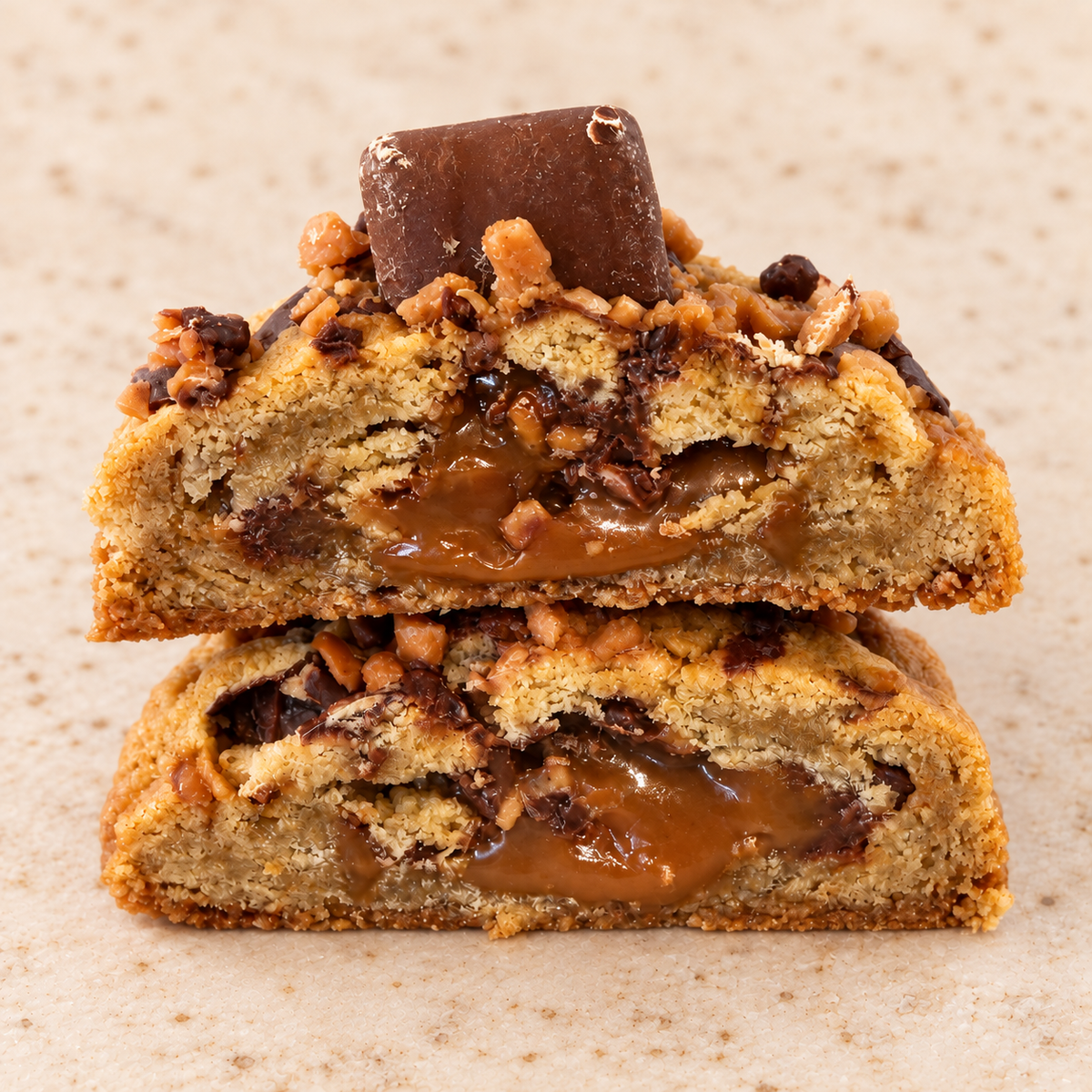 Skor Lovers cookie cut open on a cream background
